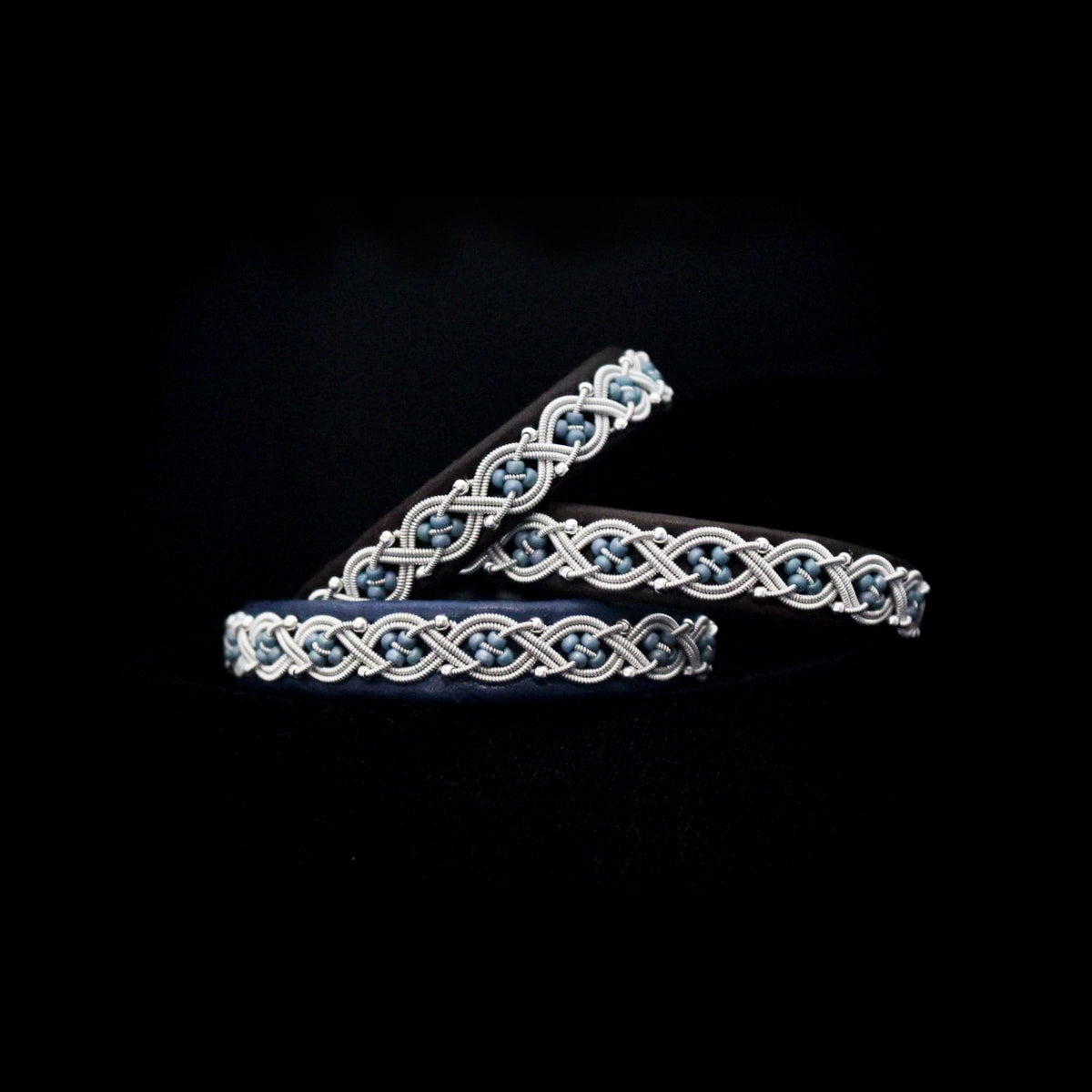 Sámi reindeer leather bracelet with braided pewter thread – forget me not

